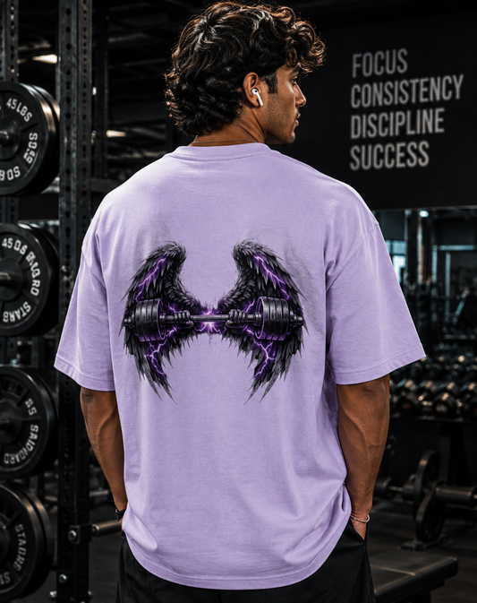 Man wearing purple oversized gym t-shirt with wing and dumbbell graphic back print
