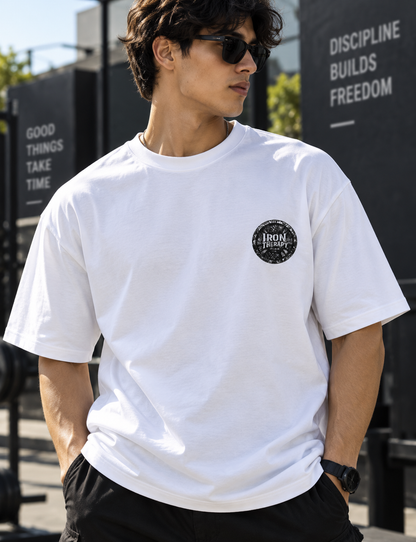 Male wearing Iron Therapy oversized gym T-shirt with chest logo