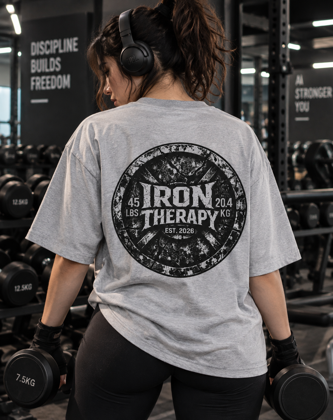 Female wearing Iron Therapy oversized gym T-shirt during workout