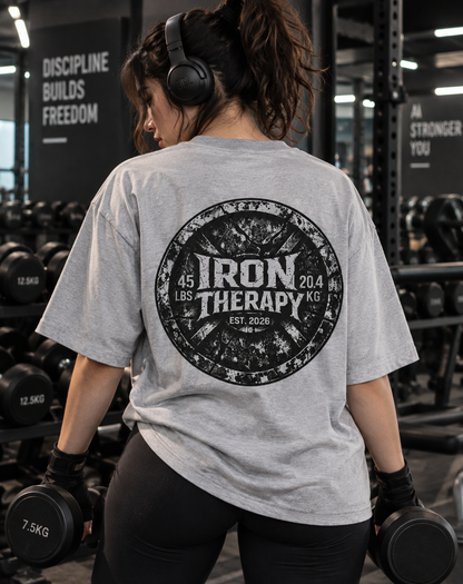 Female wearing Iron Therapy oversized gym T-shirt during workout