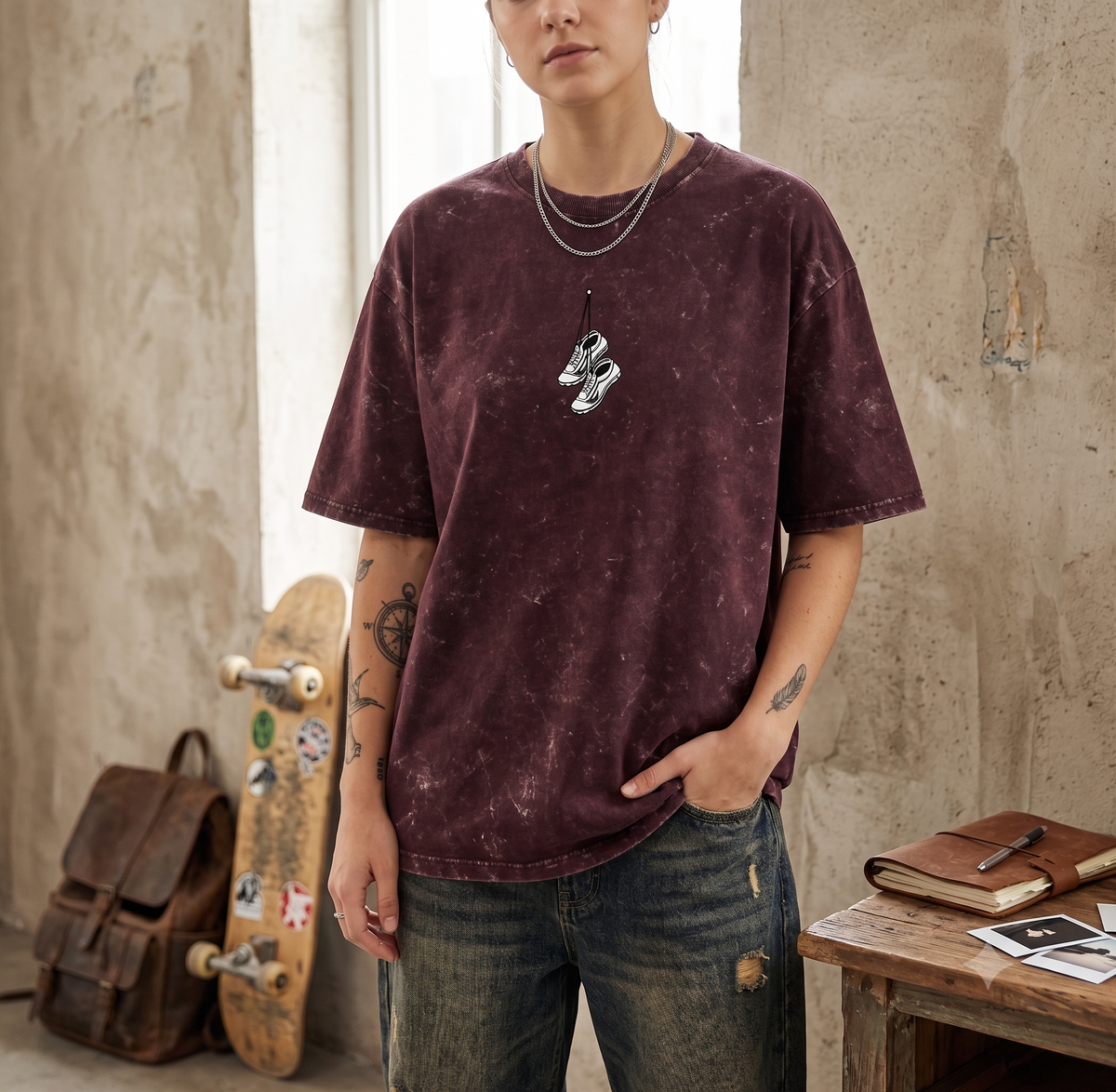 Maroon acid wash oversized gym t-shirt front view with sneakers graphic
