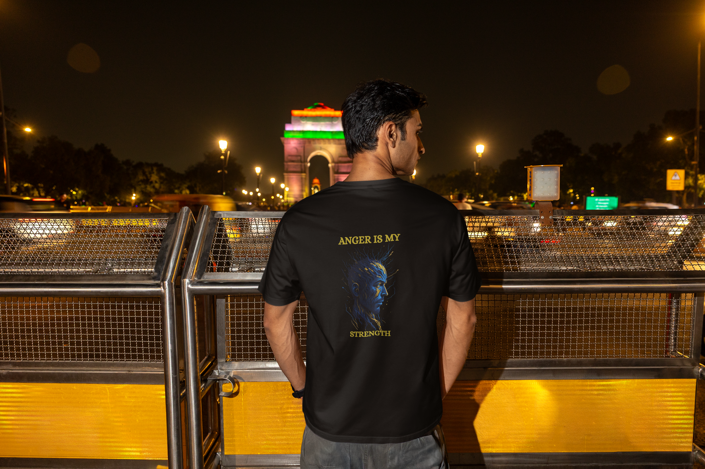 Back view of a navy blue oversized "Anger Is My Strength" graphic gym t-shirt.