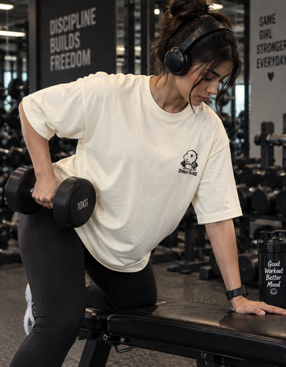 Female model wearing off-white Dino-Sore oversized workout T-shirt