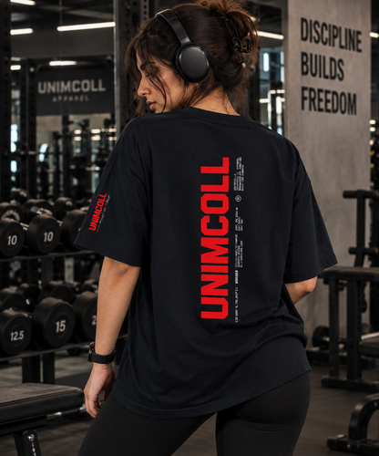 Woman wearing black UNIMCOLL oversized gym t shirt with red back print