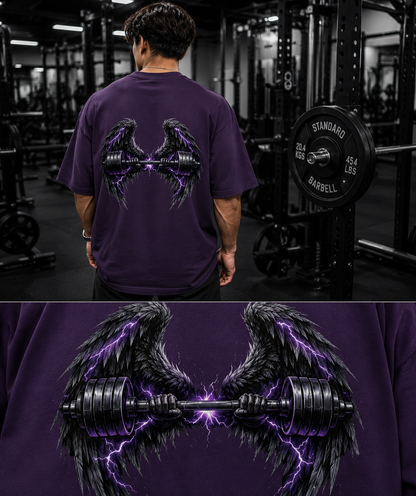 Close-up of purple lightning wing and dumbbell graphic printed on oversized gym t-shirt