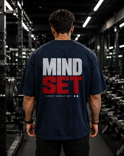 Back view of navy UNIMCOLL Mind Set oversized T-shirt with bold Mind Set gym graphic