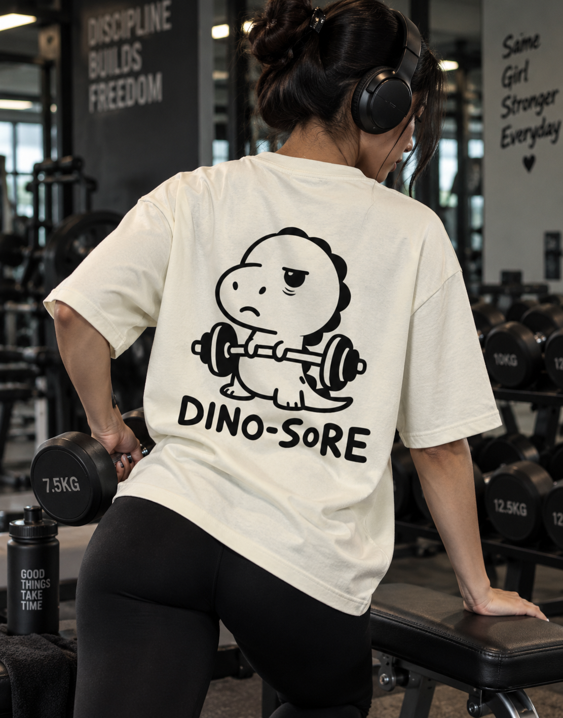 Female model wearing off-white Dino-Sore oversized workout T-shirt