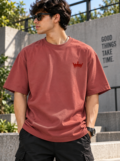 Male wearing Legacy rust oversized t shirt outdoor front view