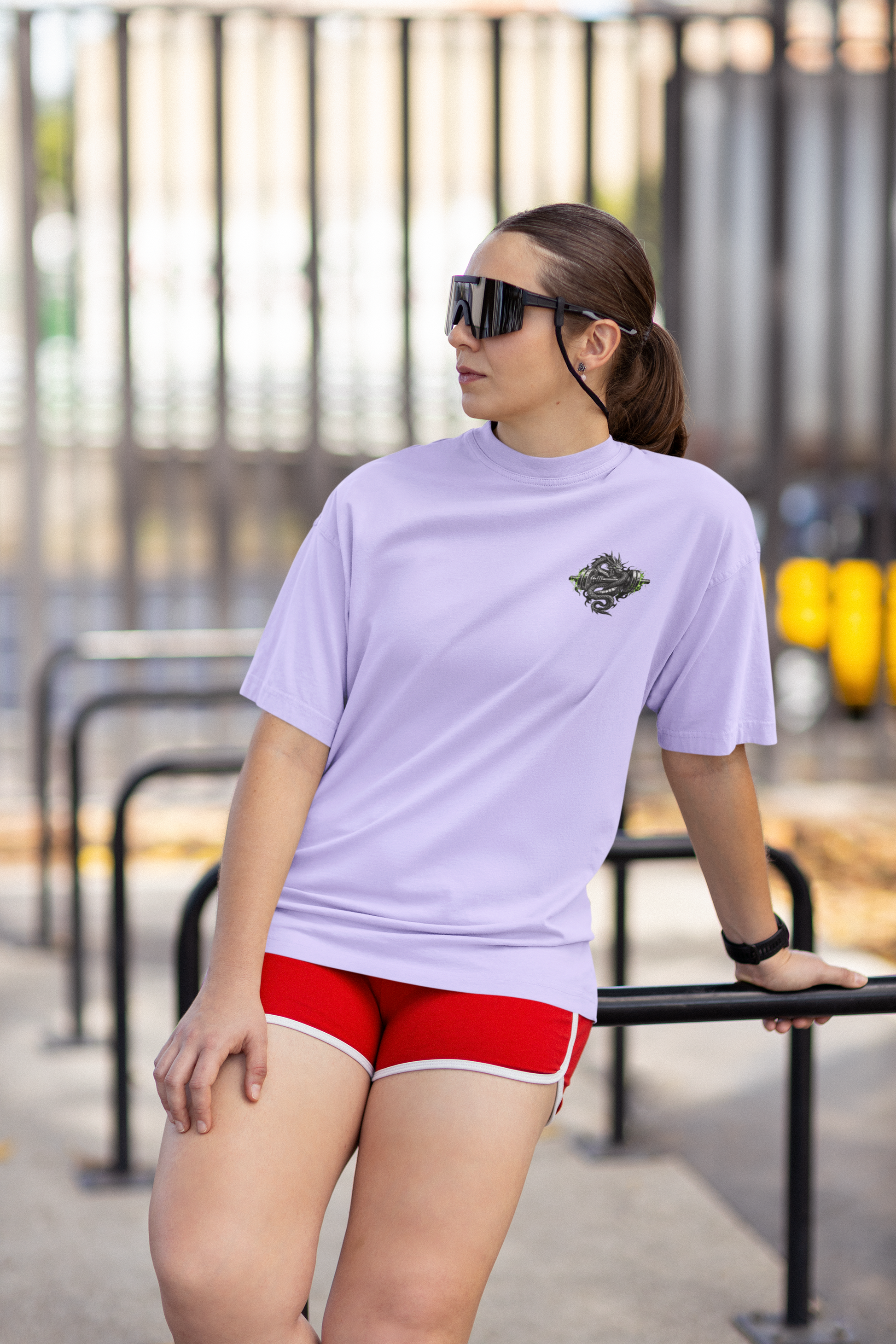 Man wearing dragon graphic back print oversized gym tee