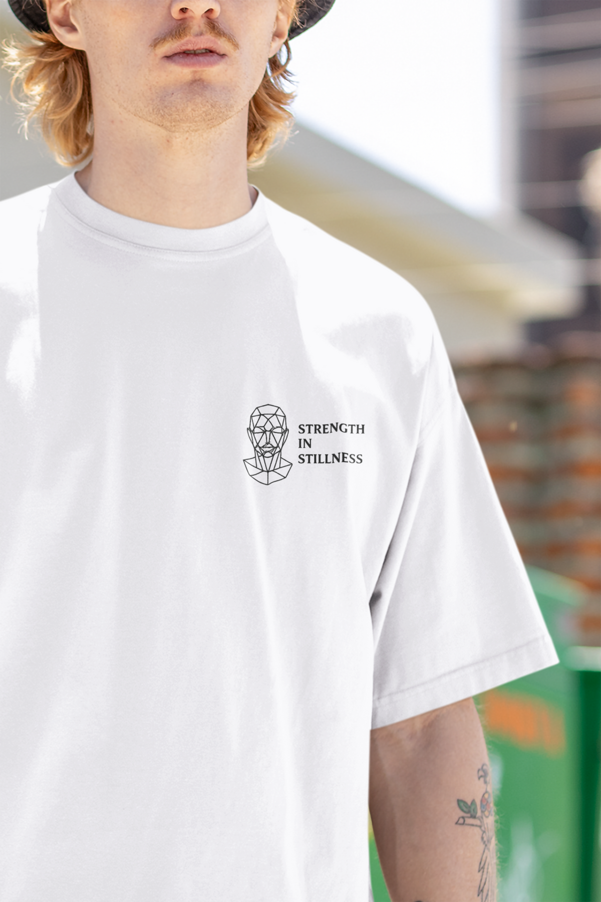 Strength In Stillness white oversized unisex t shirt front view by UNIMCOLL